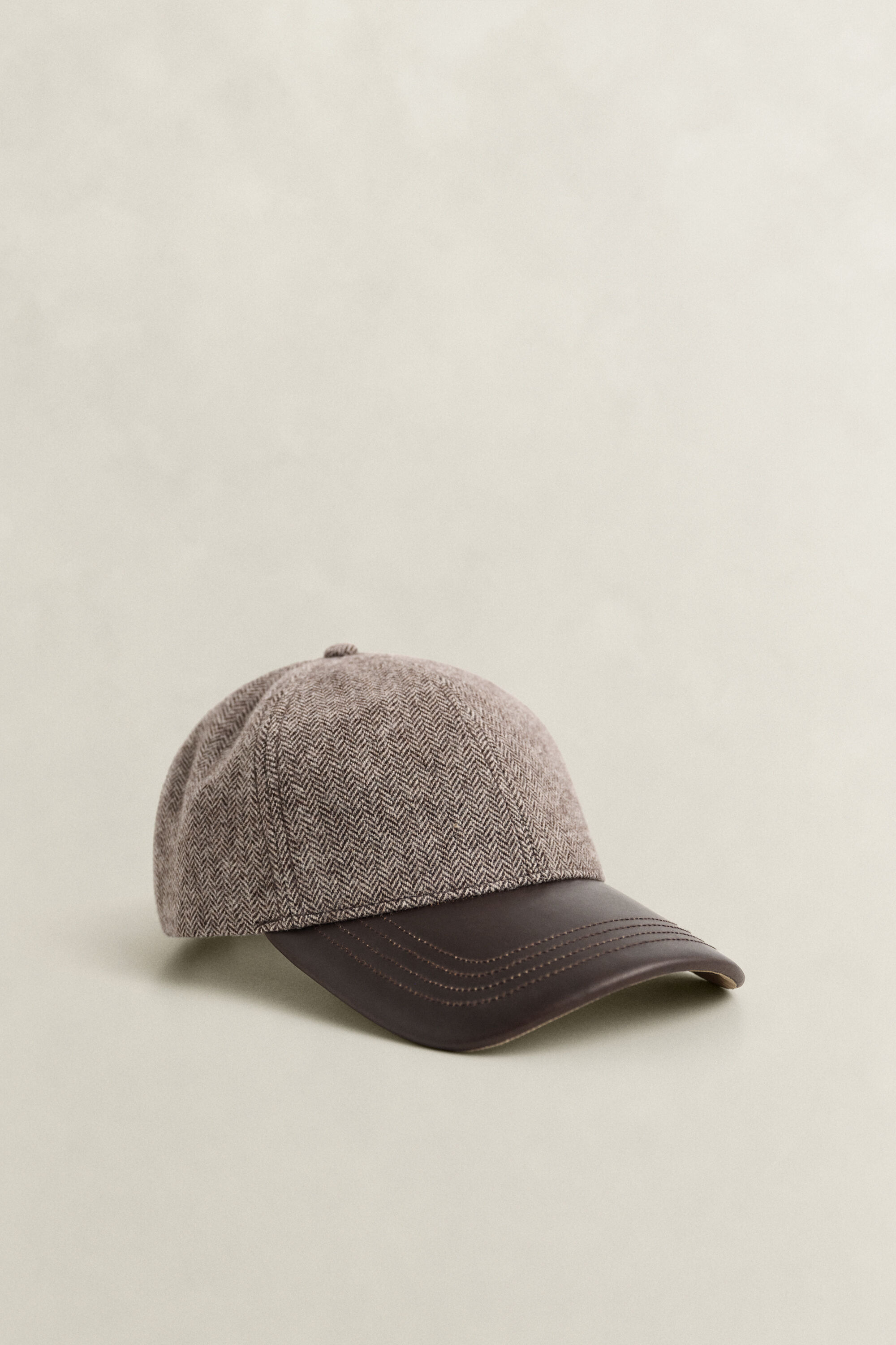 Cap aus Wollmix mit Lederschirm