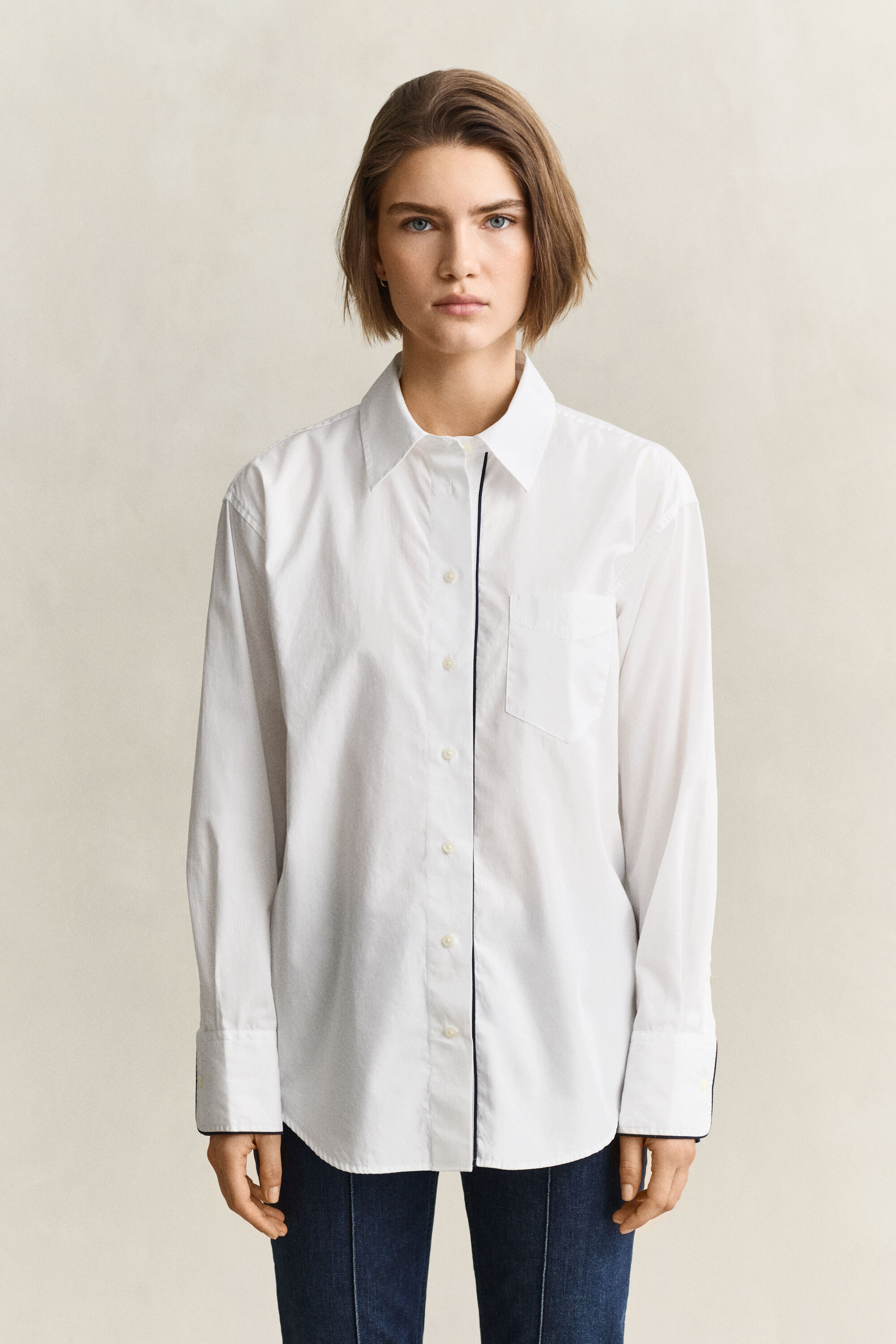 Bluse mit Paspeln