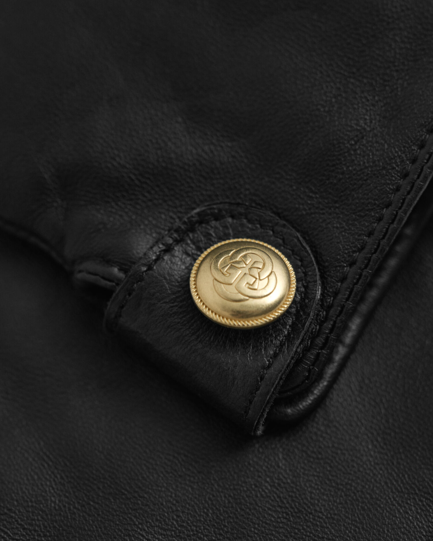 Geknöpfte Lederhandschuhe