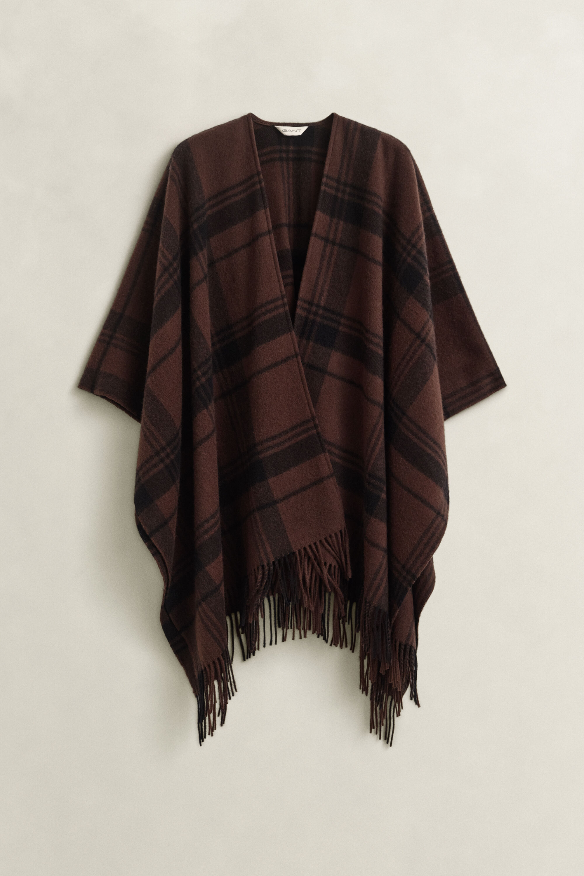 Karierter Wollponcho