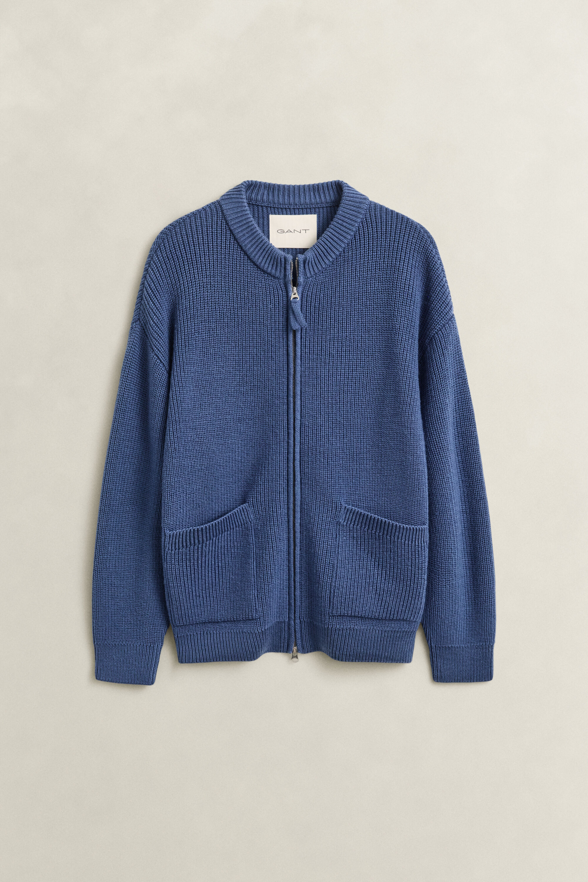 Gerippte Strickjacke aus Wolle mit Reißverschluss