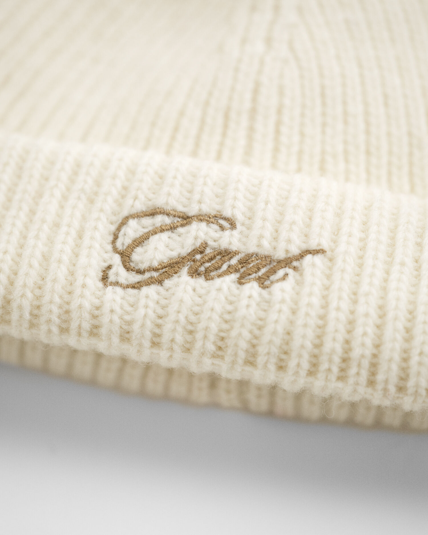 Baby Pom Pom Beanie mit Ohrenklappen