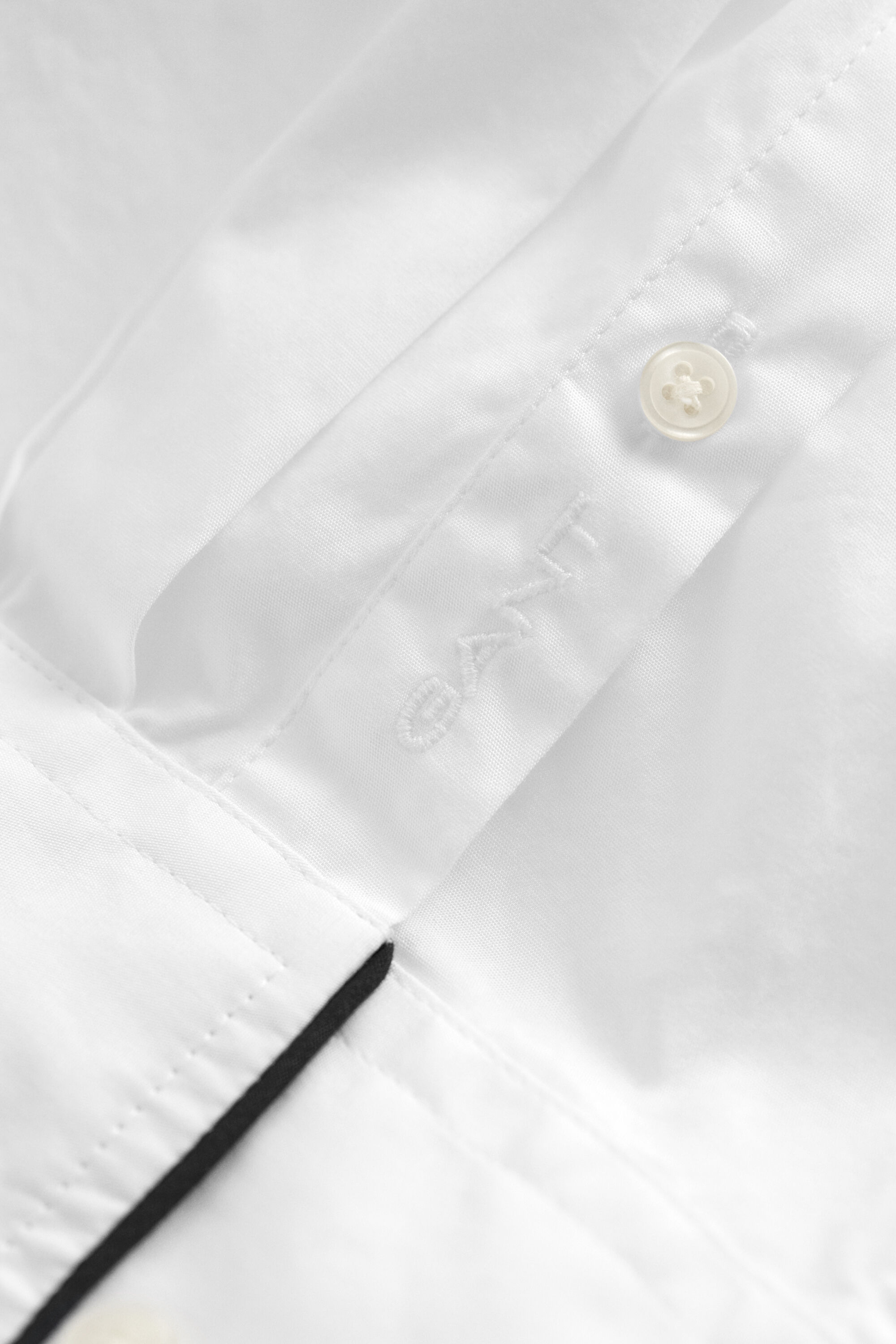 Bluse mit Paspeln